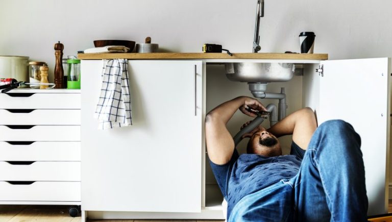 Man Under Sink