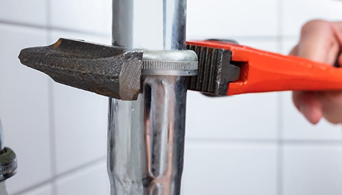 Wrench Tightening Pipe Leak